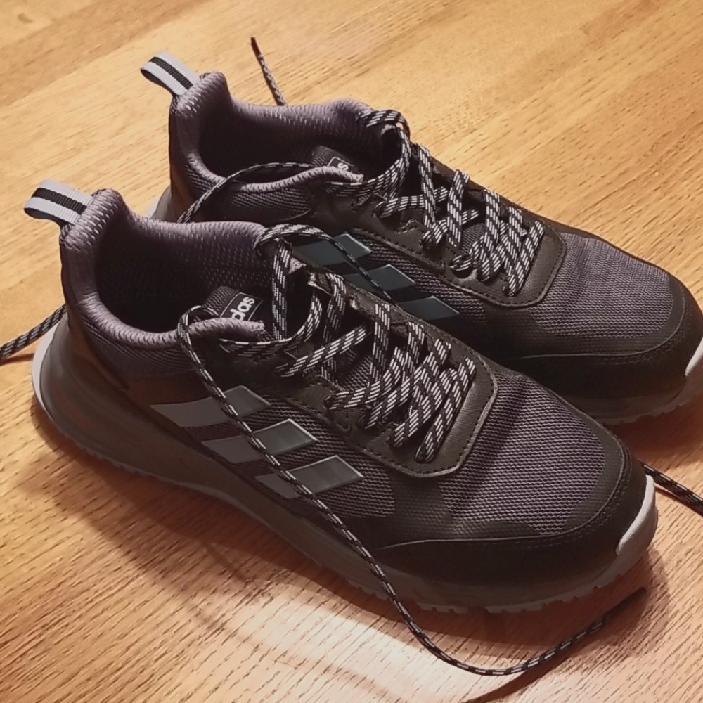 9.5 wide Addidas shoes.